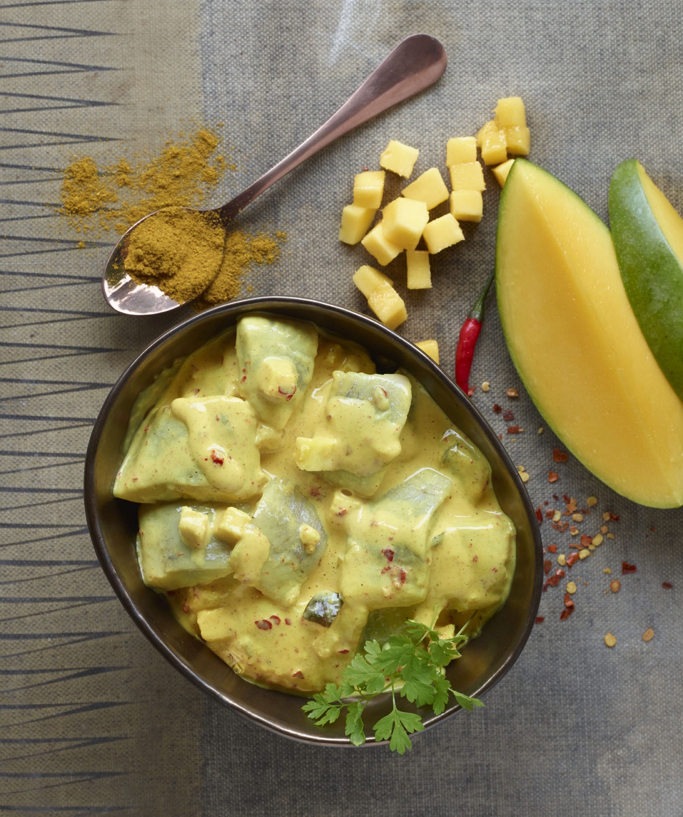 Haring met curry en mango